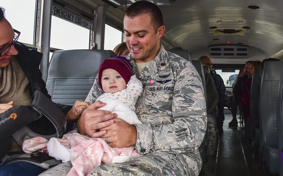 An Air Force officer with his family in the U.S.