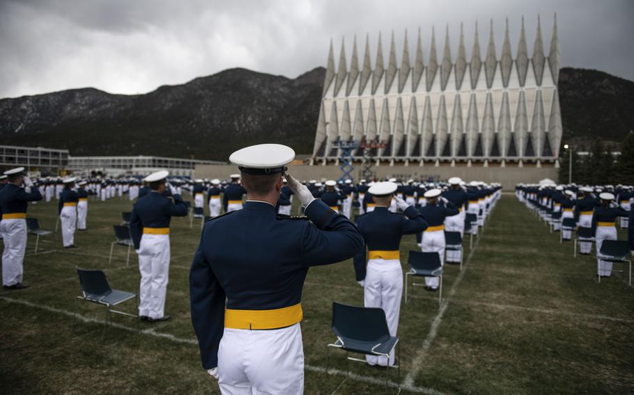 U.S. servicemembers attend a ceremony in Colorado.