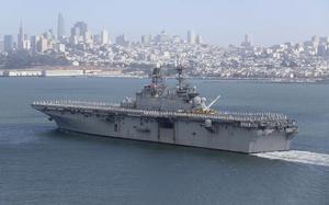 A U.S. Navy ship sails through the water near San Diego.