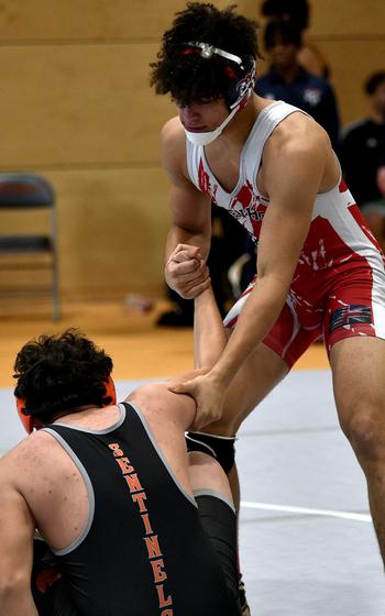 Jaden DuBois helps a foe to his feet.