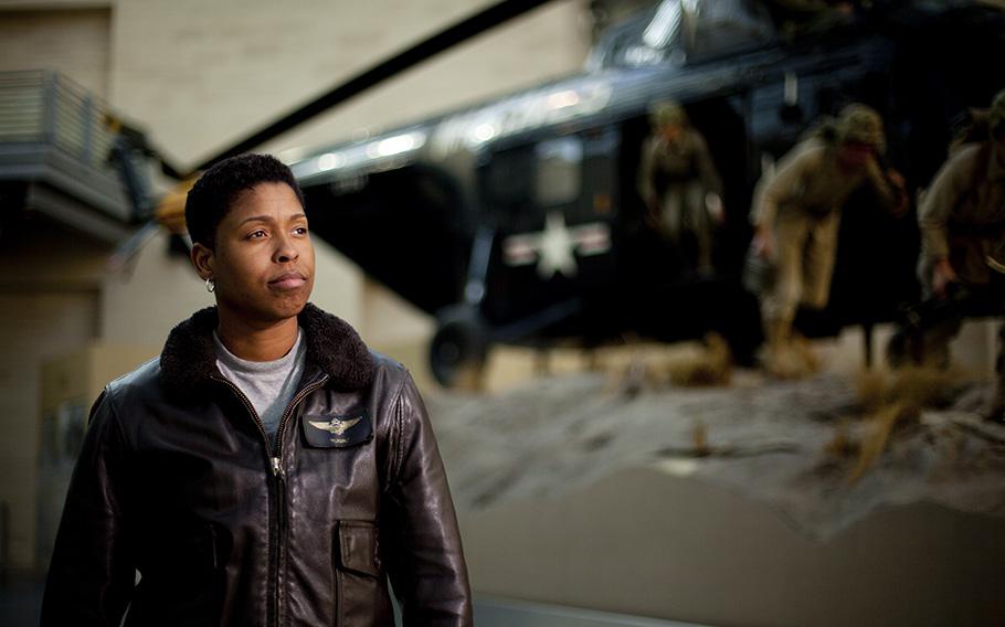 Then-Capt. Vernice Armour stands in front of an exhibit at the National Museum of the Marine Corps in February 2012.