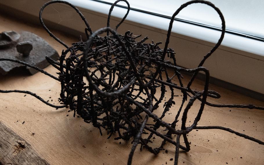 A piece of tangled barbed wire.