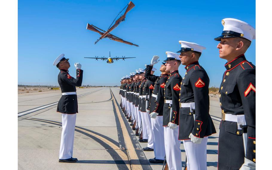 U.S. Marines with the Silent Drill Platoon execute a drill sequence