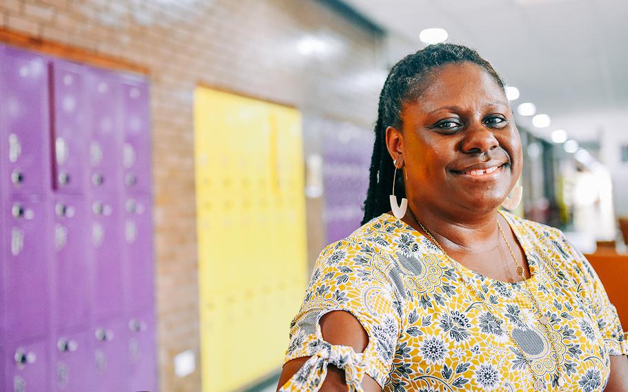 Shana Seawright, the principal of Bahrain Middle High School, smiles for a photo on the first day of class Aug. 18, 2024, in Manama, Bahrain. Seawright said she notices that the transition from fifth to sixth grade is often particularly daunting for many students, as they face new responsibilities and new independence.