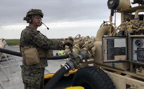 Lance Cpl. Jonathan Williamson of Marine Wing Support Squadron 271 mans a pump for aviation fuel Sept. 2, 2024,  during the U.S.-led Northern Viking exercise at Keflavik Air Base in Iceland. While on the island, Williamson and other Marines from MWSS 271 toured civilian aviation fuel facilities to increase their knowledge needed for Contingency Quality Assurance Specialist – Fuels certification.