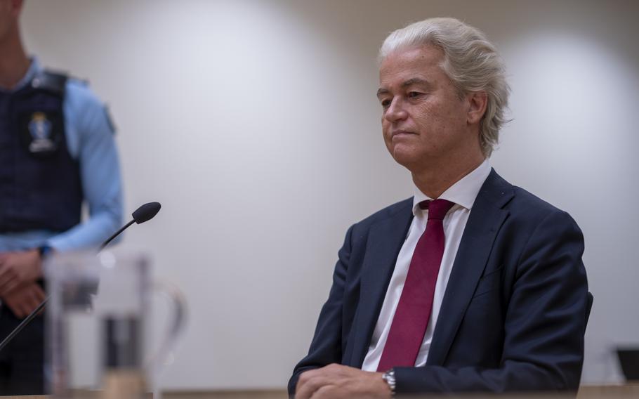 Anti-Islam lawmaker Geert Wilders, takes his seat at the high security court