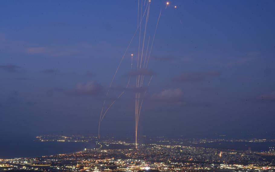 The Israel Iron Dome air defense system attempts to intercept rockets fired from Lebanon