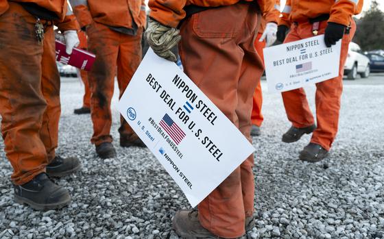 Steelworkers attend a rally in support of the sale of U.S. Steel to Nippon Steel in Clairton, Pennsylvania, on Dec. 12. MUST CREDIT: Quinn Glabicki for The Washington Post