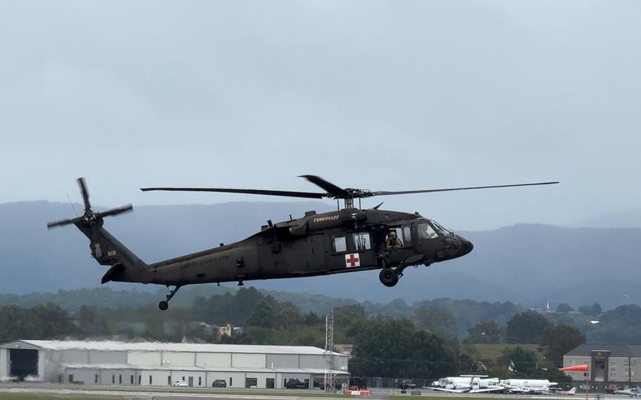 A UH-60L Black Hawk helicopter prepares for a rescue operation.