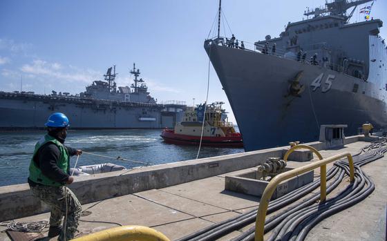 Boatswain's Mate 3rd Class Carief Smith receives a mooring line as the Whidbey Island-class dock landing ship USS Comstock (LSD 45) returns to homeport Naval Base San Diego Oct. 8, 2024. Comstock, assigned to U.S. 3rd Fleet, promoted regional stability and security, deterred aggression, and protected the free flow of commerce throughout its deployment. An integral part of U.S. Pacific Fleet, U.S. 3rd Fleet leads naval forces in the Indo-Pacific and provides the realistic, relevant training necessary to flawlessly execute our Navy’s role across the full spectrum of military operations—from combat operations to humanitarian assistance and disaster relief. U.S. 3rd Fleet works together with our allies and partners to advance freedom of navigation, the rule of law, and other principles that underpin security for the Indo-Pacific region. (U.S. Navy photo by Mass Communication Specialist 1st Class Kelby Sanders)