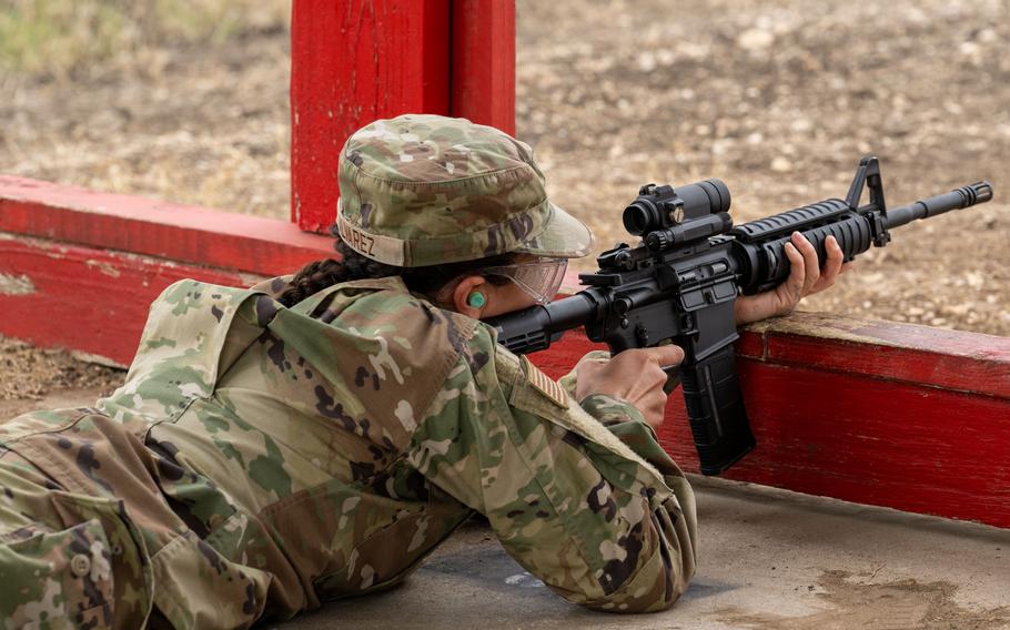 Trainee Anita Alvarez, 331st Training Squadron, lines up her shot during combat arms training