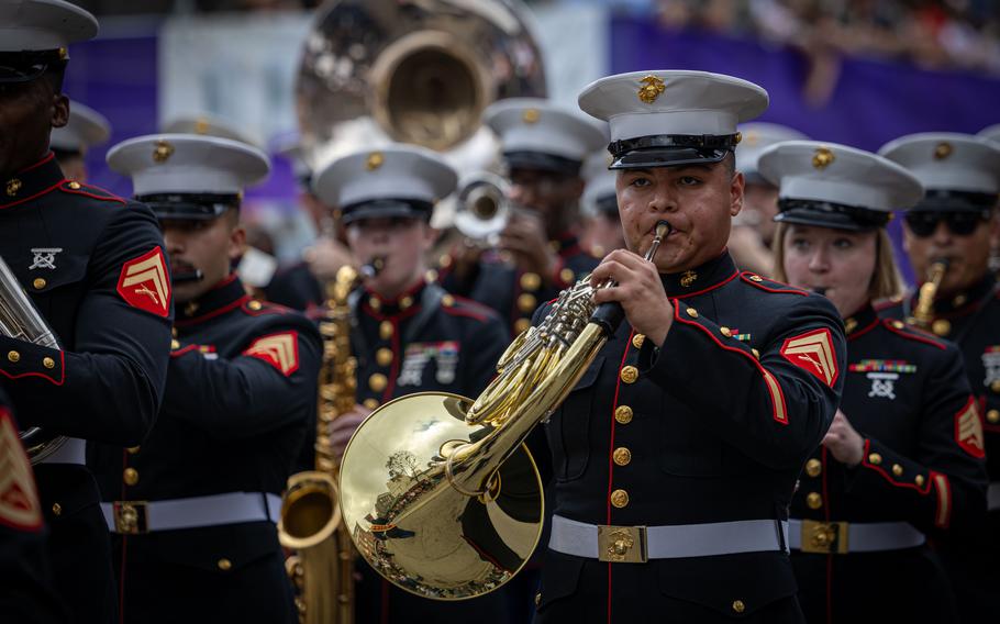 A Marine performs at the Super Bowl LIX parade