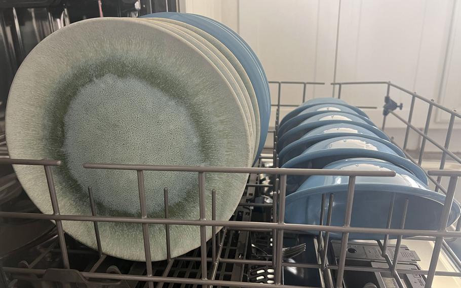 Rachel Kurzius’ rinsed dishes after going through dishwasher. 