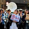 Members of Waseda University's jazz club march down the Honch during the annual jazz and rock festival in Yokosuka, Japan, Nov. 4, 2024.