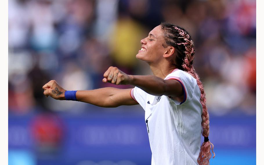 Trinity Rodman of Team United States celebrates victory after the Women’s Quarterfinal match against Japan during the Paris 2024 Olympic Games at Parc des Princes on Saturday, Aug. 3, 2024, in Paris. 