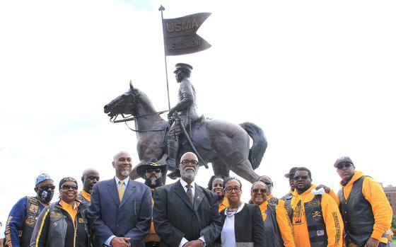 Members from the Buffalo Soldiers Motorcycle Club of West Point pose in front of the newly unveiled Buffalo Soldier Monument Statue on Sept. 10 at the U.S. Military Academy in West Point, NY.