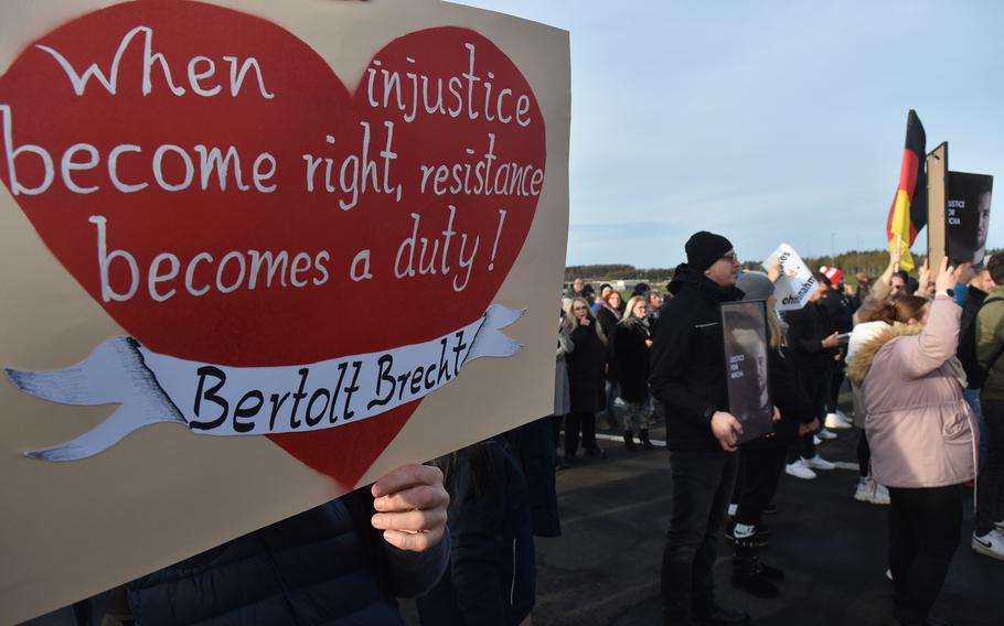 People protest outside a U.S. Air Force base in Germany.