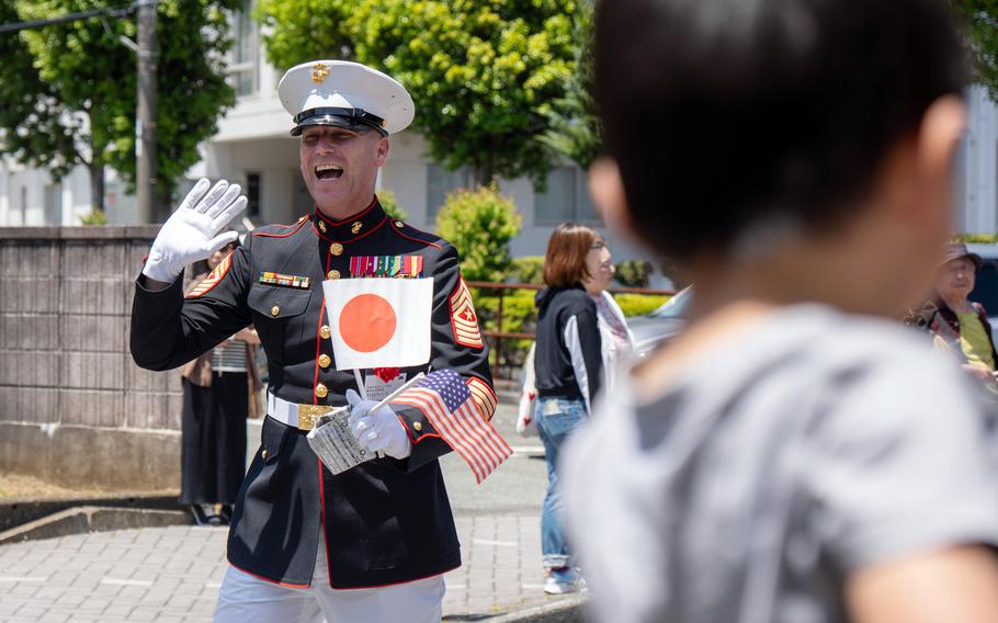 A U.S. Marine parades through Shimoda, Japan, during the 85th annual Black Ship Festival, May 18, 2024.