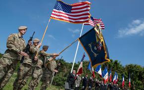 American troops participate in a remembrance ceremony at Pointe du Hoc in Normandy, France, on Wednesday, June 5, 2024. 

