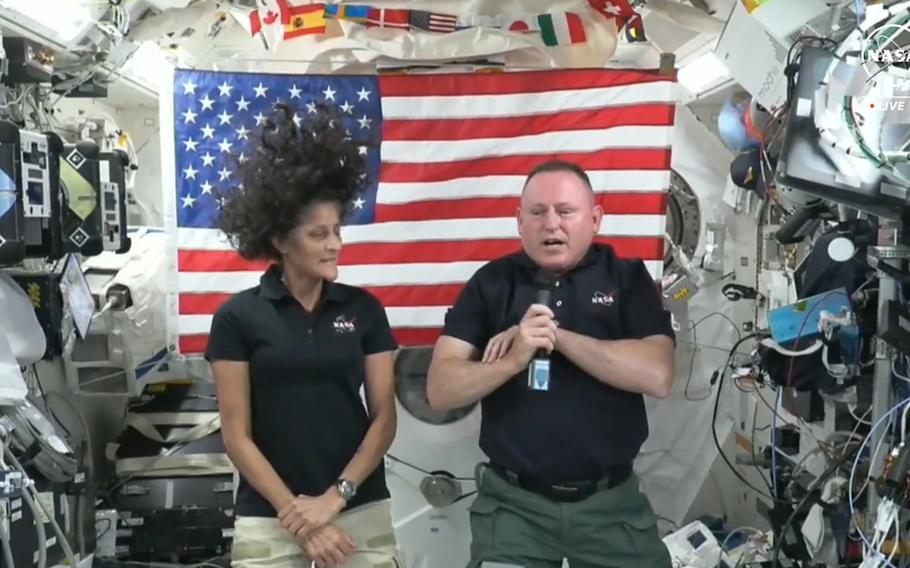 Astronauts Suni Williams, left, and Butch Wilmore give a news conference aboard the International Space Station on July 10, 2024. 