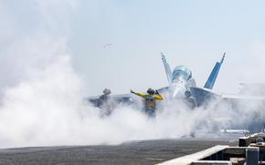 250313-N-SW048-1189 U.S. CENTRAL COMMAND AREA OF RESPONSIBILITY (March 13, 2025) A U.S. Navy Aviation Boatswain's Mate (Aircraft Handling) directs an F/A-18F Super Hornet, attached to Strike Fighter Squadron (VFA) 11, to an aircraft catapult on the flight deck of the Nimitz-class aircraft carrier USS Harry S. Truman (CVN 75) in the U.S. Central Command area of responsibility. (Official U.S. Navy photo)