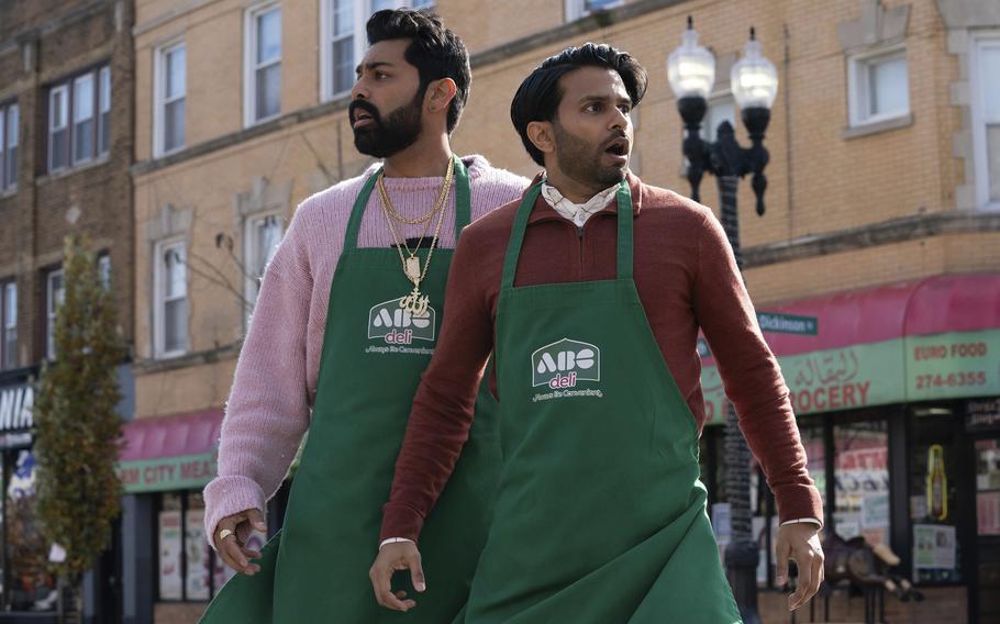 Saagar Shaikh, left, and Asif Ali wearing their aprons in a scene from “Deli Boys.” 