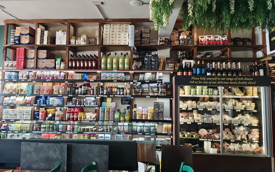 In the deli section of Limoncello, an Italian restaurant in Cambridge, England, a plethora of food and beverage items is offered for sale. All products are sourced from various parts of Italy. 