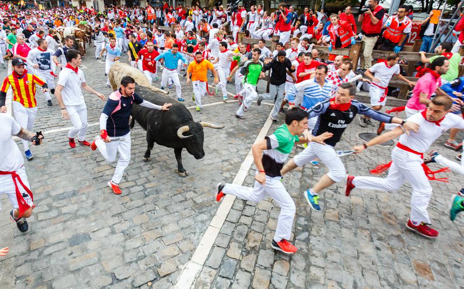 The infamous running of the bulls takes place during the festival of San Fermin in Pamplona, Spain, which is scheduled for July 6-14 this year.