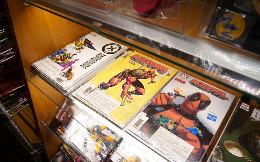 Toho Cinemas Shinjuku sells a lot of movie merchandise, including “Deadpool & Wolverine” keychains, towels, shirts, mugs and stickers. 