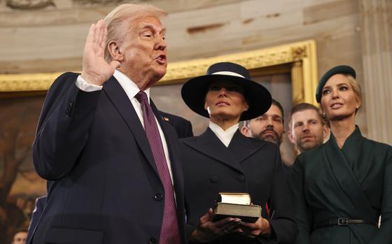 President-elect Donald Trump takes the oath of office as he is sworn in as president during the 60th Presidential Inauguration in the Rotunda of the U.S. Capitol in Washington, Monday, Jan. 20, 2025. (Chip Somodevilla/Pool Photo via AP)