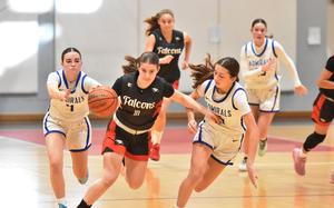 AOSR’s Silvia Goldman dribbles upcourt as Rota’s Jourdan Timmons, right, stays with her and Kate Warkentein tries to grab the ball from behind on Saturday, Jan. 11, 2025.

Kent Harris/Stars and Stripes