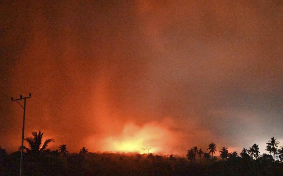 The sky glows from the eruption of Mount Lewotobi Laki-Laki