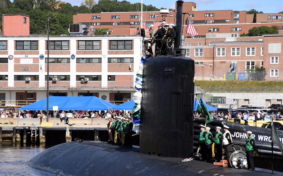 The USS Montpelier, similar to the nuclear-propelled fast-attack subs to be acquired by Australia from the United States, arrives at Naval Submarine Base New London in Groton, Conn., Sept. 19, 2021.