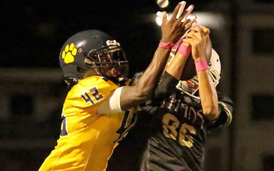 Tiyan’s Roberto Duran intercepts a pass intended for Guam High’s Cameron Brantley.