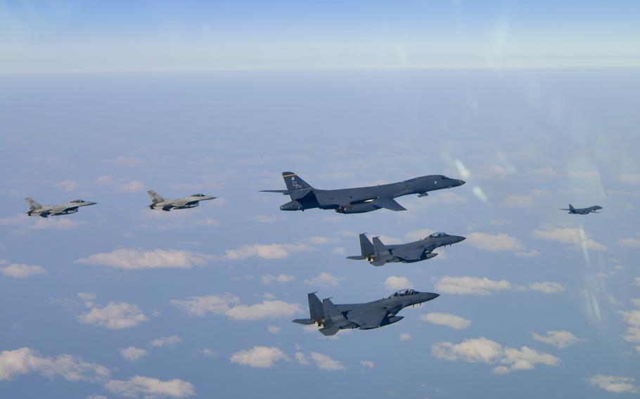 Two Air Force B-1B Lancers fly alongside F-16 Fighting Falcons and South Korean air force F-15K Slam Eagles