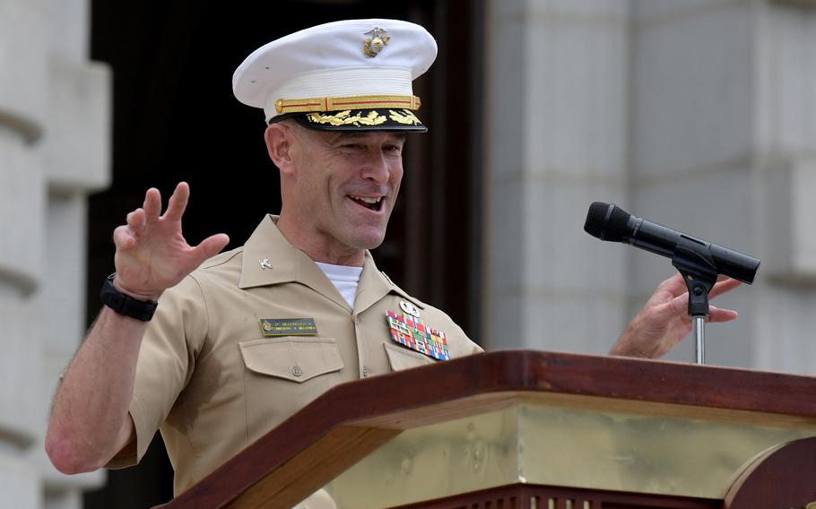 Outgoing Commandant of Midshipmen Marine Col. James P. McDonough III gives remarks at the academy. 