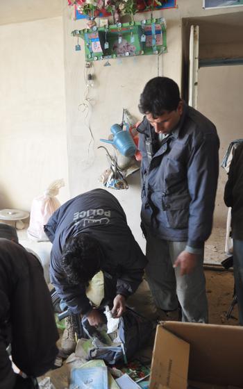 U.S. soldiers with the 4th Squadron, 73rd Cavalry Regiment of the 82nd Airborne and Afghan National Police search a suspect’s home in the village of Dashta Bam in the Pashtun Zarghun district of Herat province  in search of a bomb triggerman. 