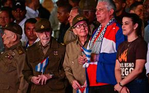 Left to right, Commander Guillermo Garcia, Commander Ramiro Valdez, Cuban former President Raul Castro and Cuban President Miguel Diaz-Canel take part in the Torchlight March commemorating the 171th anniversary of the birth of national hero, poet and activist Jose Marti in Havana, on Jan. 27, 2024. (Adalberto Roque/AFP/Getty Images/TNS)