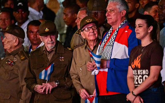 Left to right, Commander Guillermo Garcia, Commander Ramiro Valdez, Cuban former President Raul Castro and Cuban President Miguel Diaz-Canel take part in the Torchlight March commemorating the 171th anniversary of the birth of national hero, poet and activist Jose Marti in Havana, on Jan. 27, 2024. (Adalberto Roque/AFP/Getty Images/TNS)