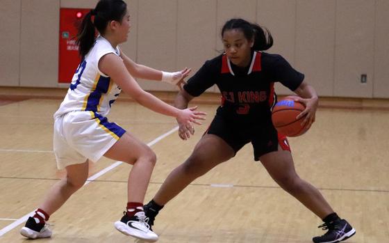 King's Moa Best pulls up against CAJ defender Christina Park in the final.