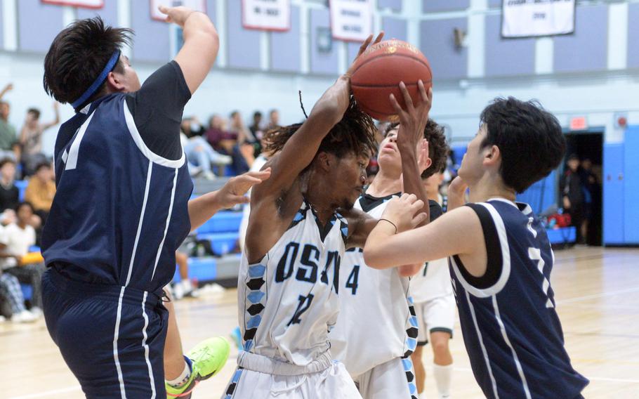 Nysean Shorter grabs a rebound.