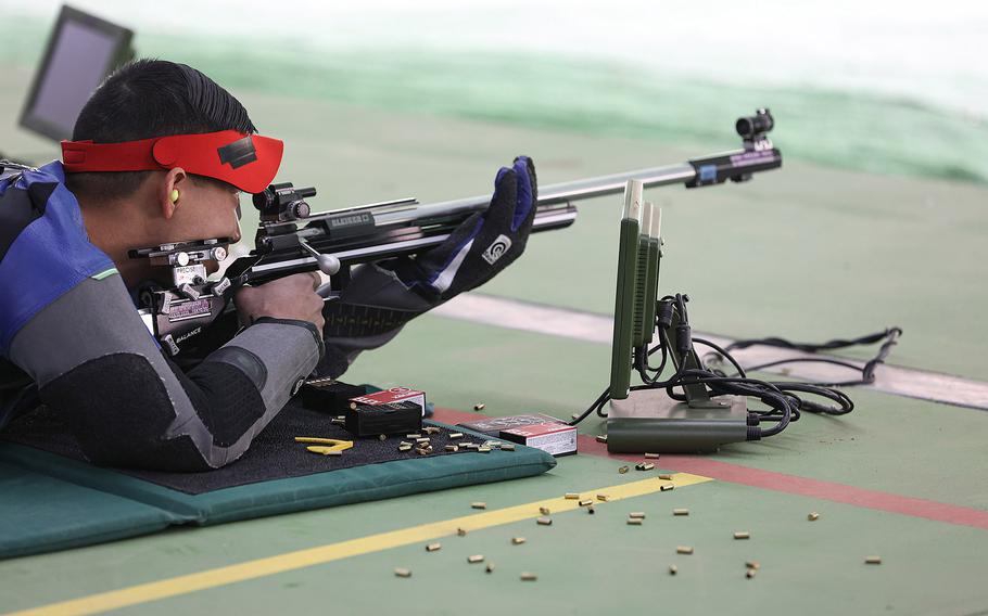 Army Staff Sgt. Kevin Nguyen looks through his sights during the 50-meter rifle shooting SH1 prone event at the 2023 Parapan American Games in Santiago, Chile, Nov. 21, 2023.