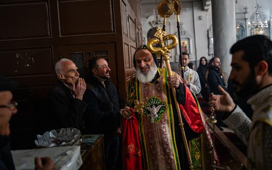 Ignatius Aphrem II, patriarch of the Syriac Orthodox Church, at Christmas Eve Mass at St. George’s Syriac Orthodox Church in Damascus. MUST CREDIT: Salwan Georges/The Washington Post