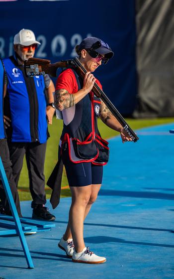 Army Staff Sgt. Rachel Tozier enters the range during the first day of qualification in the Olympic women's trap competition on Tuesday, July 30, 2024, at the Chateauroux Shooting Center in Chateauroux, France.