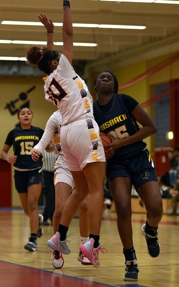 Elizabeth Agudzi-Addo drives to the basket.