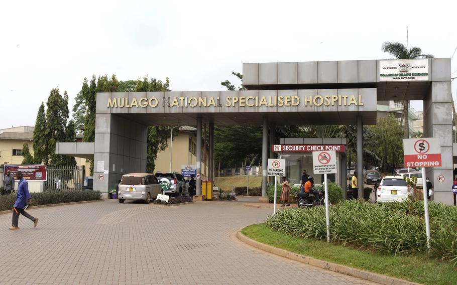 People walk outside the Mulago National Hospital