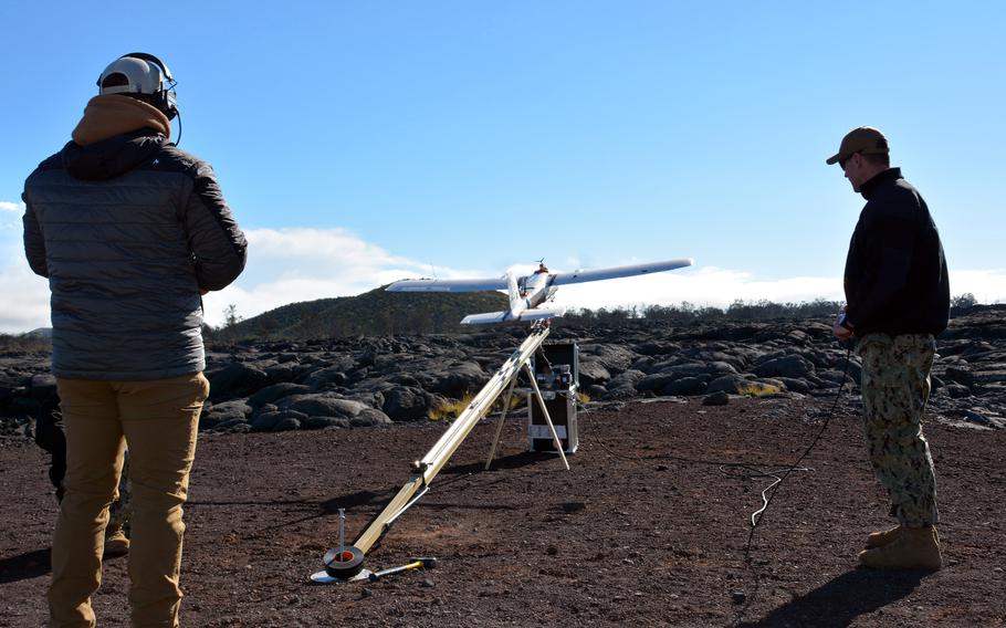 Technicians from the Naval Air Warfare Center Weapons Division in China Lake, Calif., launch a target drone at Pohakuloa Training Area, Hawaii, Jan. 25, 2025.