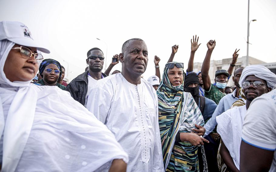 Presidential candidate Biram Ould Dah Ould Abeid, center, takes part in a rally among his supporters, ahead of the presidential election end of the month, in Nouakchott, Mauritania, on June 24, 2024. 