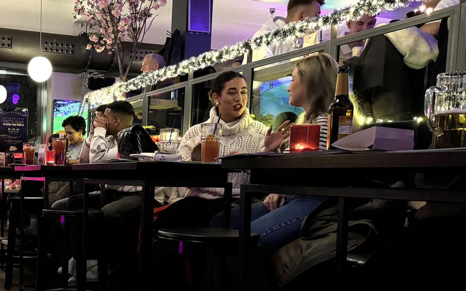 Patrons in a Frankfurt, Germany restaurant.