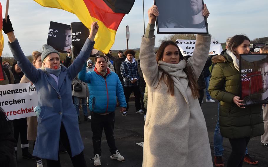 People protest outside a U.S. Air Force base in Germany.